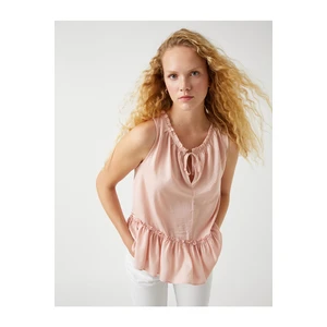 Koton Sleeveless blouse with fastening detail, satin look.