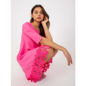 Loose pink cocktail dress with openwork hem