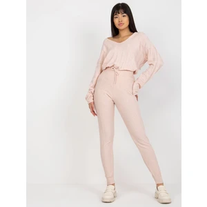 Light pink women's knitted trousers with tie