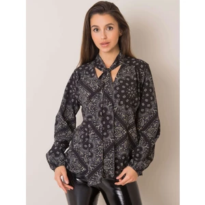 Black patterned blouse with a tie