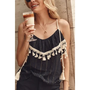 Black boho blouse with tassels on hangers