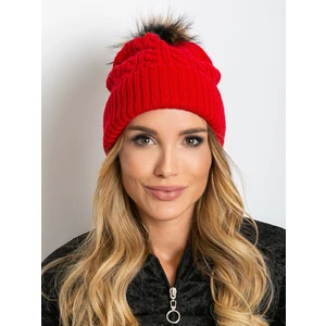 Cap with a braid weave and a fur pompom red