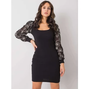 Black dress with puff sleeves from Formosa RUE PARIS
