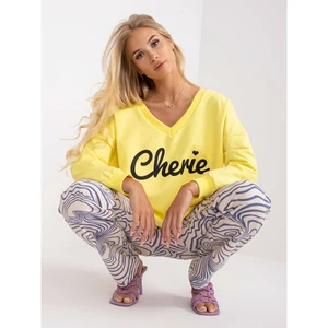 Yellow women's sweatshirt with a cotton print