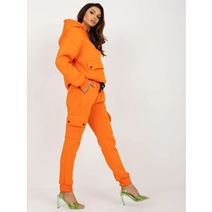 Orange tracksuit with oversized sweatshirt