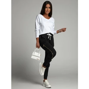 Set of women's cargo trousers and white and black blouse