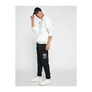 Koton Basic Jogger Sweatpants with Cargo Pocket Detail, Label Printed, Tie Waist.