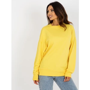 Yellow loose sweatshirt without hood with a round neckline