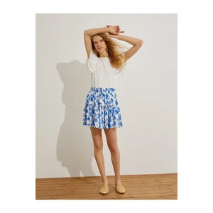 Koton Tiered Mini Skirt with Floral Tassel Detail.