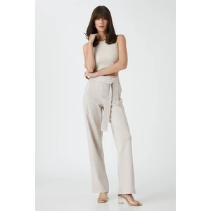 Koton The Straight Leg Trousers have a Belted Waist.