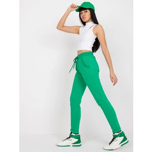 Dark green cotton sweatpants with a high waist