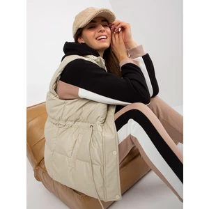 Light beige down vest made of artificial leather without hood