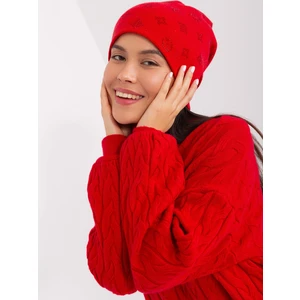 Red winter hat with appliqués