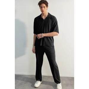 Trendyol Limited Edition Black / Wide Leg Textured Wrinkle-Free Hidden Drawstring One Piece Sweatpants