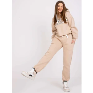 Beige tracksuit with Laraina inscription