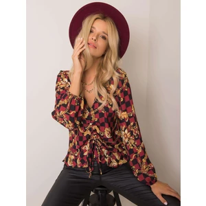 Maroon and black blouse with a print