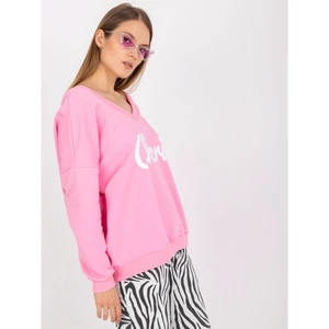 Pink and white printed sweatshirt with a loose cut