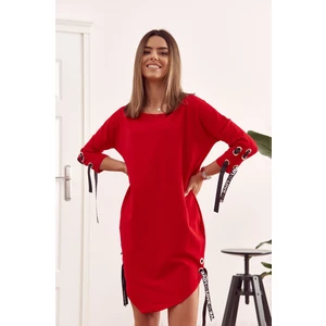 Asymmetrical oversize dress with red tie