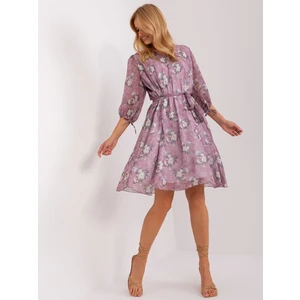 Lady's purple floral dress