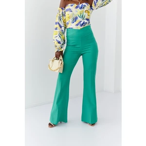 Elegant green women's trousers with flared legs