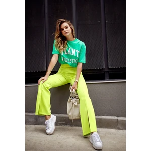 Lady's elegant trousers with slit neon lime