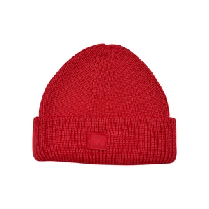 Knitted woolen hat with a large volume