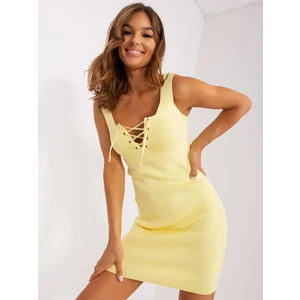 Light yellow minidress with tie at neckline