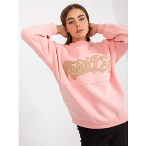 Light pink hoodie with patches