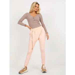 Peach baggy zippered sweatpants