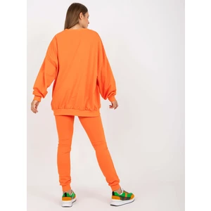 Orange tracksuit with patches