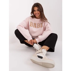 Light pink hoodie with inscription