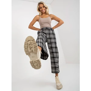 Black fabric culotte trousers with checkered pattern